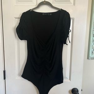 Fashion to figure black bodysuit never worn 14/16